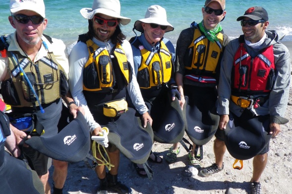 Five guys wearing Seals skirts and Kokatat PFDs